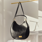 Yve bag as a crossbody bag in black