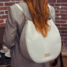 Model with Yve Bag as a backpack in cream