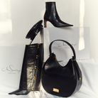 Yve set consisting of handbag, baker boy cap, and high shaft boots in black