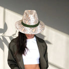 Model with Hat Ethosia in snake with olive