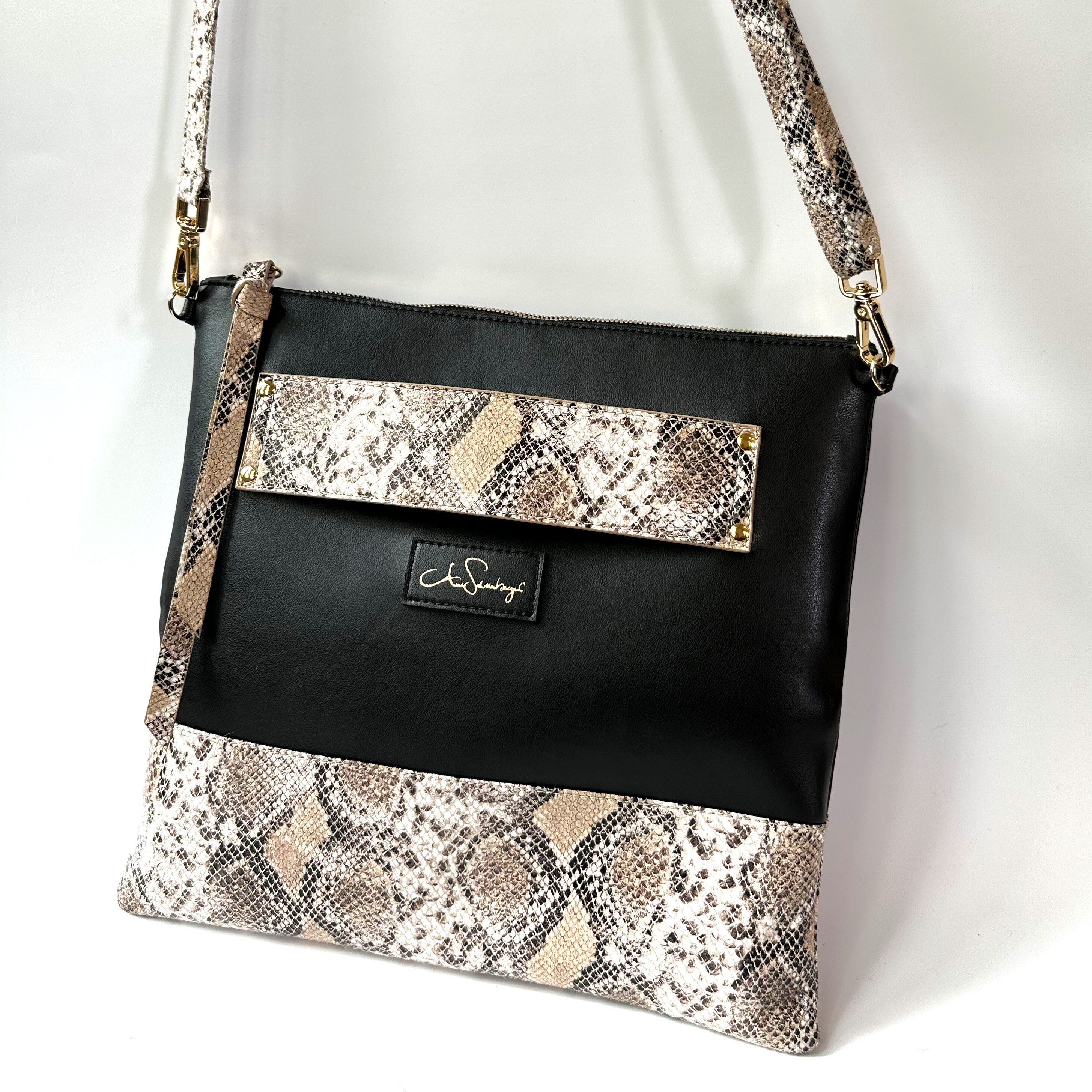 Snake print bag black top