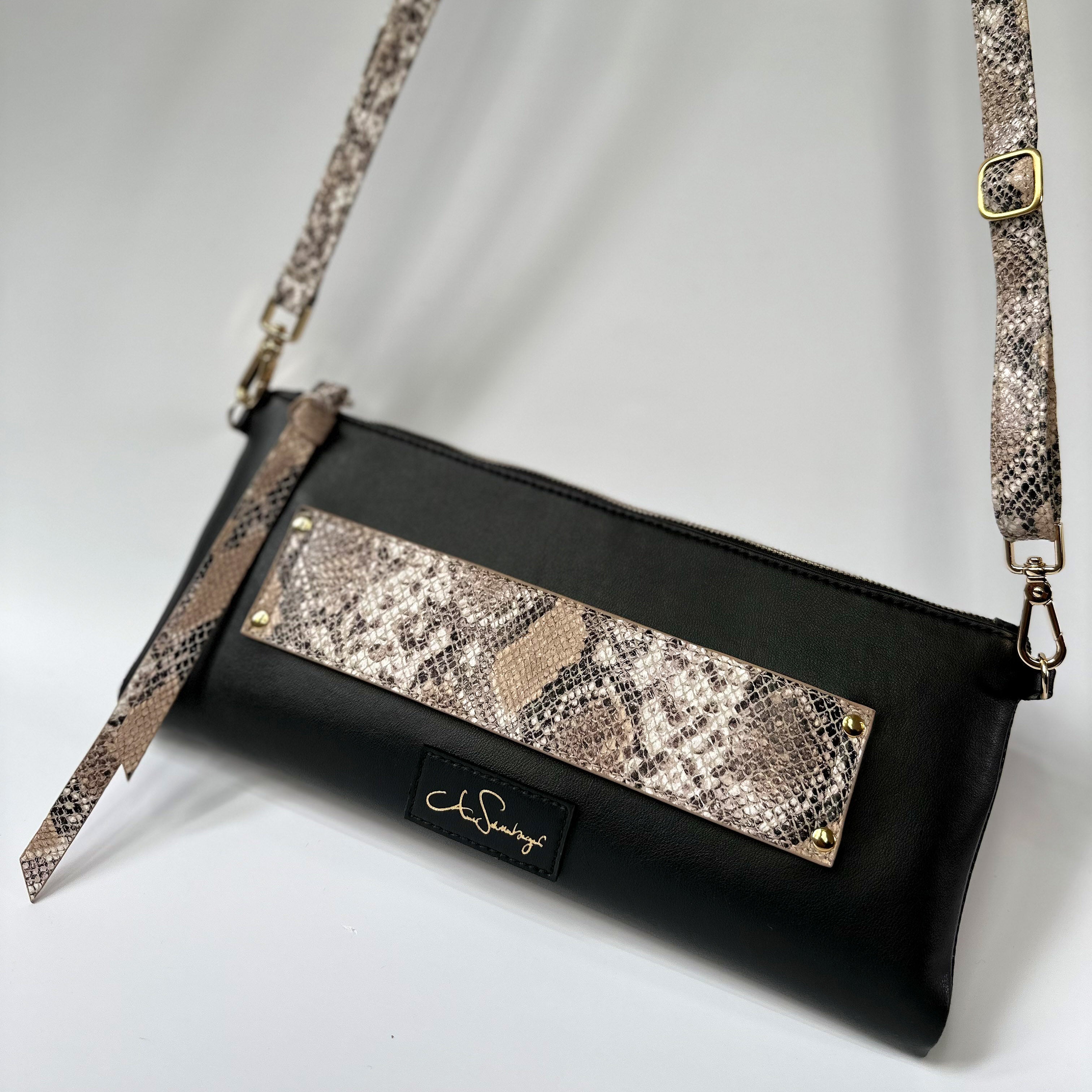 High quality designer bag made from vegan leather in black snake Anne Schollenberger